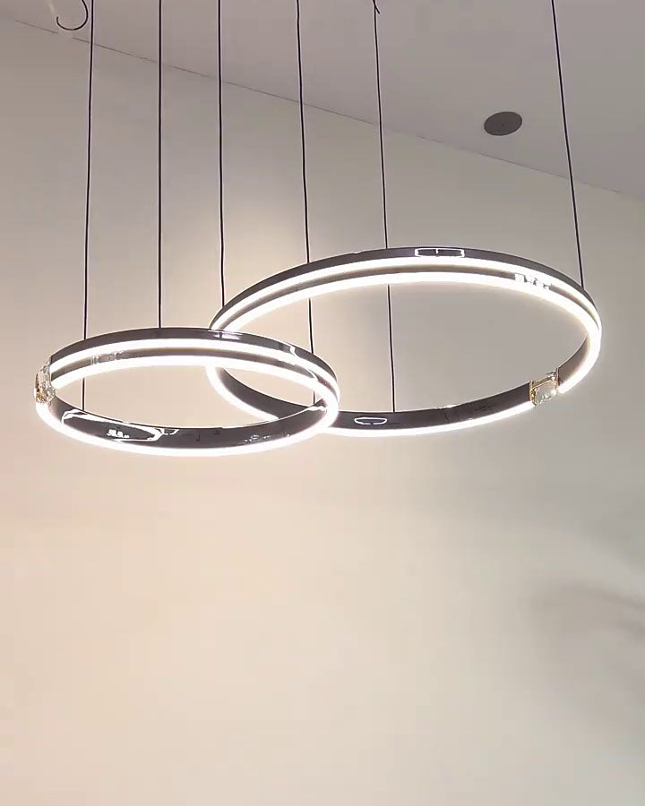 Neutral-light setting reveals the balanced proportions of the modern geometric chandelier while providing clear everyday illumination.